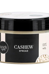 Levann cashew spread in a sleek jar, featuring a minimalist black and white design, showcasing natural ingredients.